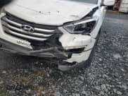 ✅ 2014 Hyundai Santa Fe • VIN: 5XYZUDLB8EG159107 • Lot: 89474465. Listed on Copart with 135,472 mi. Free auction sales archive from the USA and detailed vehicle history report at DreamBid. Image 13.