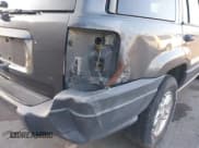 ✅ 2003 Jeep Grand Cherokee Laredo • VIN: 1J4GW48S03C595326 • Lot: 43837212. Listed on IAAI with Not provided. Free auction sales archive from the USA and detailed vehicle history report at DreamBid. Image 6.