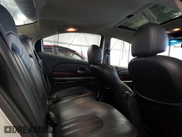 ✅ 2003 Chrysler 300M M • VIN: 2C3HE66G73H577060 • Lot: 69861115. Listed on Copart with 126,678 mi. Free auction sales archive from the USA and detailed vehicle history report at DreamBid. Image 10.