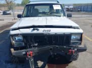 ✅ 1995 Jeep Cherokee Sport • VIN: 1J4FJ68S1SL576255 • Lot: 42178902. Listed on IAAI with 214,041 mi. Free auction sales archive from the USA and detailed vehicle history report at DreamBid. Image 6.