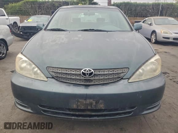 ✅ 2002 Toyota Camry XLE • VIN: JTDBE30K420099583 • Lot: 94325855. Listed on Copart with 202,517 mi. Free auction sales archive from the USA and detailed vehicle history report at DreamBid. Image 5.