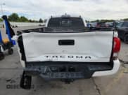 ✅ 2018 Toyota Tacoma TRD Off Road • VIN: 3TMDZ5BN2JM042195 • Lot: 81576125. Listed on Copart with 90,967 mi. Free auction sales archive from the USA and detailed vehicle history report at DreamBid. Image 6.