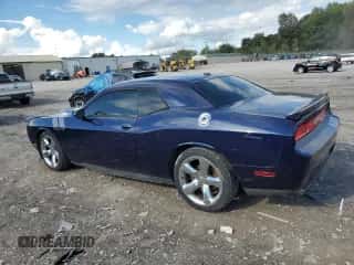 2014 Dodge Challenger R/T z VIN 2C3CDYBT4EH160607, wystawiony jako Copart lot #83985475 z przebiegiem 169 739 mil mil oraz Szkoda całkowita • Salvage title. Historia ofert i sprzedaży dostępna na DreamBid. Obrazek 2.