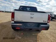 ✅ 2017 Honda Ridgeline RTL • VIN: 5FPYK3F56HB038290 • Lot: 71868305. Wystawiony na Copart z przebiegiem 166 108 mil. Bezpłatny archiwum sprzedaży aukcyjnych z USA i szczegółowy raport historii pojazdu na DreamBid. Zdjęcie 6.