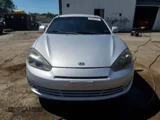 2008 Hyundai Tiburon GS с VIN KMHHM66D98U277685, выставлен на аукционе Copart как лот 65806505 с пробегом 145 826 миль миль и Списание • Salvage title. История ставок и продаж доступна на DreamBid. Изображение 5.