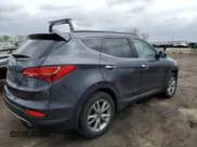 ✅ 2015 Hyundai Santa Fe Limited • VIN: 5XYZUDLA6FG297513 • Лот: 48683133. Опубликован ранее на Copart с пробегом 92 870 миль. Бесплатный доступ к архиву аукционных продаж из США и подробный отчёт об истории автомобиля на DreamBid. Изображение 3.