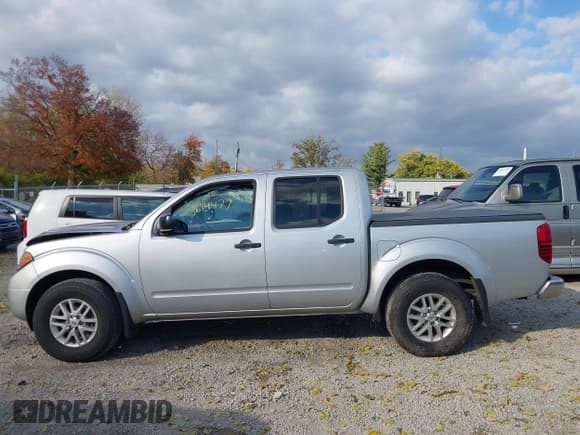 ✅ 2021 Nissan Frontier SV • VIN: 1N6ED0EB0MN718576 • Lot: 43614477. Listed on IAAI with 51,567 mi. Free auction sales archive from the USA and detailed vehicle history report at DreamBid. Image 15.