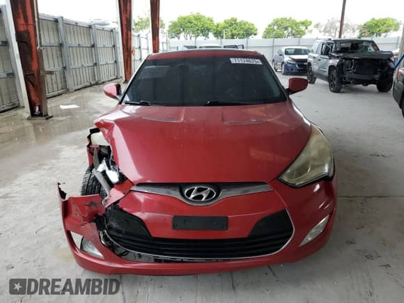 2012 Hyundai Veloster w/Gray Int с VIN KMHTC6AD0CU023165, выставлен на аукционе Copart как лот 71174675 с пробегом 151 996 миль миль и Списание • Salvage title. История ставок и продаж доступна на DreamBid. Изображение 5.