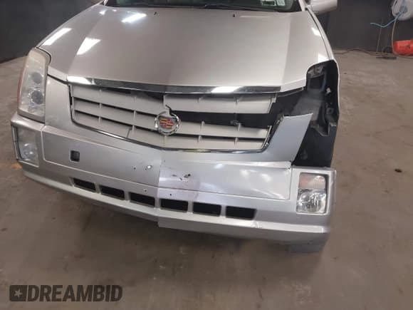 ✅ 2008 Cadillac SRX AWD • VIN: 1GYEE437780136042 • Lot: 42552302. Wystawiony na IAAI z przebiegiem 121 023 mil. Bezpłatny archiwum sprzedaży aukcyjnych z USA i szczegółowy raport historii pojazdu na DreamBid. Zdjęcie 6.