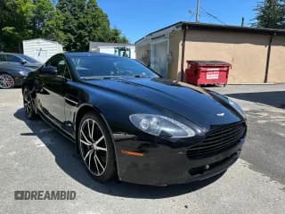 ✅ 2011 Aston Martin Vantage • VIN: SCFEFBAK2BGC14745 • Lot: 67236345. Wystawiony na Copart z przebiegiem 77 389 mil. Bezpłatny archiwum sprzedaży aukcyjnych z USA i szczegółowy raport historii pojazdu na DreamBid. Zdjęcie 1.