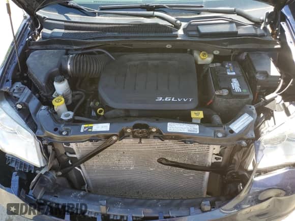 2013 Dodge Grand Caravan SXT с VIN 2C4RDGBG9DR562585, выставлен на аукционе Copart как лот 66472605 с пробегом 138 584 миль миль и Списание • Salvage title. История ставок и продаж доступна на DreamBid. Изображение 12.