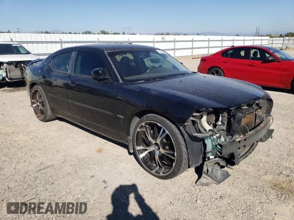 2006 Dodge Charger R/T z VIN 2B3KA53H26H398869, wystawiony jako Copart lot #73536984 z przebiegiem 152 284 mil mil oraz Szkoda całkowita • Salvage title. Historia ofert i sprzedaży dostępna na DreamBid. Obrazek 4.