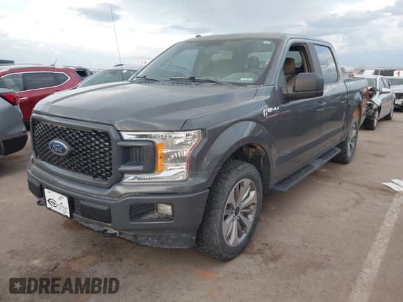 ✅ 2018 Ford F-150 Lariat • VIN: 1FTEW1E51JFB44816 • Lot: 43503234. Listed on IAAI with 128,610 mi. Free auction sales archive from the USA and detailed vehicle history report at DreamBid. Image 2.
