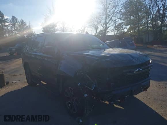 2022 Chevrolet Tahoe Z71 z VIN 1GNSKPKD3NR277652, wystawiony jako IAAI lot #41335976 z przebiegiem 42 982 mil mil oraz . Historia ofert i sprzedaży dostępna na DreamBid. Obrazek 1.