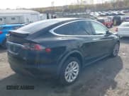 ✅ 2018 Tesla Model X 75D • VIN: 5YJXCDE28JF123376 • Lot: 43592584. Listed on IAAI with 46,004 mi. Free auction sales archive from the USA and detailed vehicle history report at DreamBid. Image 4.