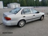 ✅ 2000 Chevrolet Prizm • VIN: 1Y1SK5282YZ435916 • Lot: 80698165. Listed on Copart with 170,524 mi. Free auction sales archive from the USA and detailed vehicle history report at DreamBid. Image 3.