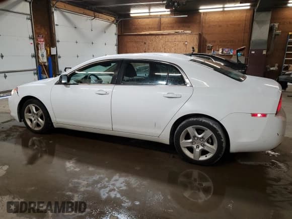 ✅ 2011 Chevrolet Malibu 1LS • VIN: 1G1ZB5E10BF252565 • Lot: 82637954. Listed on Copart with 105,950 mi. Free auction sales archive from the USA and detailed vehicle history report at DreamBid. Image 2.