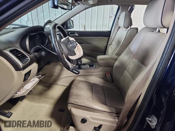✅ 2014 Jeep Grand Cherokee Overland • VIN: 1C4RJFCG1EC233696 • Lot: 86623075. Listed on Copart with 140,470 mi. Free auction sales archive from the USA and detailed vehicle history report at DreamBid. Image 7.