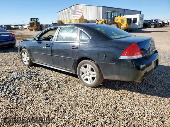 ✅ 2014 Chevrolet Impala LT • VIN: 2G1WB5E3XE1185540 • Лот: 90579415. Опубликован ранее на Copart с пробегом 105 489 миль. Бесплатный доступ к архиву аукционных продаж из США и подробный отчёт об истории автомобиля на DreamBid. Изображение 2.