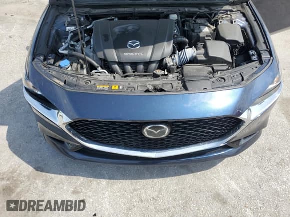 ✅ 2022 Mazda 3 Carbon Edition • VIN: 3MZBPACL4NM314915 • Lot: 64549615. Listed on Copart with 60,782 mi. Free auction sales archive from the USA and detailed vehicle history report at DreamBid. Image 11.