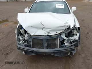 2007 Hyundai Tiburon GT с VIN KMHHN66F17U245469, выставлен на аукционе IAAI как лот 42065200 с пробегом 209 049 миль миль и . История ставок и продаж доступна на DreamBid. Изображение 6.