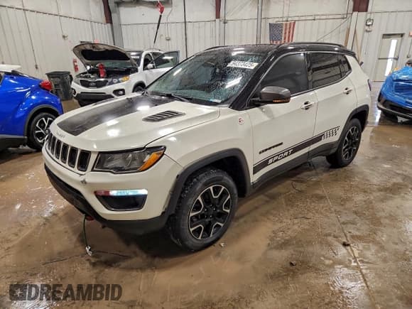 ✅ 2020 Jeep Compass Trailhawk • VIN: 3C4NJDDB7LT195740 • Лот: 94373425. Опубликован ранее на Copart с пробегом 89 774 миль. Бесплатный доступ к архиву аукционных продаж из США и подробный отчёт об истории автомобиля на DreamBid. Изображение 1.
