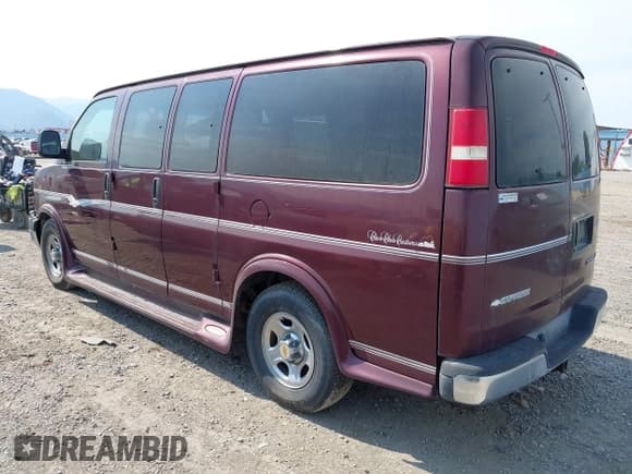 ✅ 2004 Chevrolet Express Passenger • VIN: 1GBFG15T441149305 • Lot: 43040447. Listed on IAAI with 169,635 mi. Free auction sales archive from the USA and detailed vehicle history report at DreamBid. Image 3.