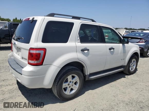✅ 2009 Ford Escape Hybrid • VIN: 1FMCU49359KA25561 • Lot: 59199755. Listed on Copart with 100,258 mi. Free auction sales archive from the USA and detailed vehicle history report at DreamBid. Image 3.