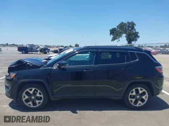 ✅ 2019 Jeep Compass Limited • VIN: 3C4NJCCB5KT675592 • Lot: 42555440. Listed on IAAI with 122,405 mi. Free auction sales archive from the USA and detailed vehicle history report at DreamBid. Image 14.