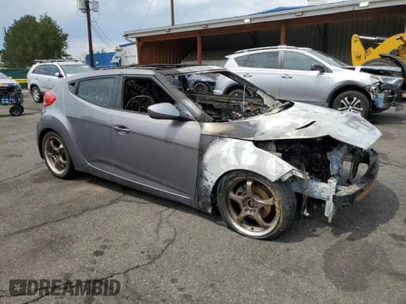 2012 Hyundai Veloster w/Gray Int с VIN KMHTC6AD0CU076898, выставлен на аукционе Copart как лот 69108635 с пробегом Не указан миль и На запчасти • Non repairable. История ставок и продаж доступна на DreamBid. Изображение 4.
