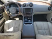 ✅ 2014 Jaguar XJ • VIN: SAJWA1CZ4E8V71167 • Лот: 43994545. Опубликован ранее на Copart с пробегом 69 682 миль. Бесплатный доступ к архиву аукционных продаж из США и подробный отчёт об истории автомобиля на DreamBid. Изображение 8.