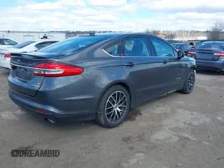 ✅ 2017 Ford Fusion Hybrid SE • VIN: 3FA6P0LU2HR314450 • Lot: 41683743. Listed on IAAI with 170,404 mi. Free auction sales archive from the USA and detailed vehicle history report at DreamBid. Image 4.