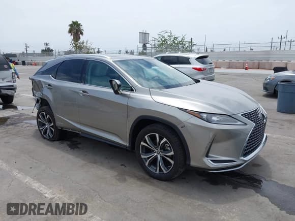 ✅ 2022 Lexus RX 450h • VIN: 2T2HGMDA1NC094391 • Lot: 42540195. Listed on IAAI with 33,328 mi. Free auction sales archive from the USA and detailed vehicle history report at DreamBid. Image 1.