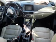 ✅ 2016 Mazda CX-5 Grand Touring • VIN: JM3KE4DY4G0701398 • Lot: 91670355. Wystawiony na Copart z przebiegiem 153 254 mil. Bezpłatny archiwum sprzedaży aukcyjnych z USA i szczegółowy raport historii pojazdu na DreamBid. Zdjęcie 8.