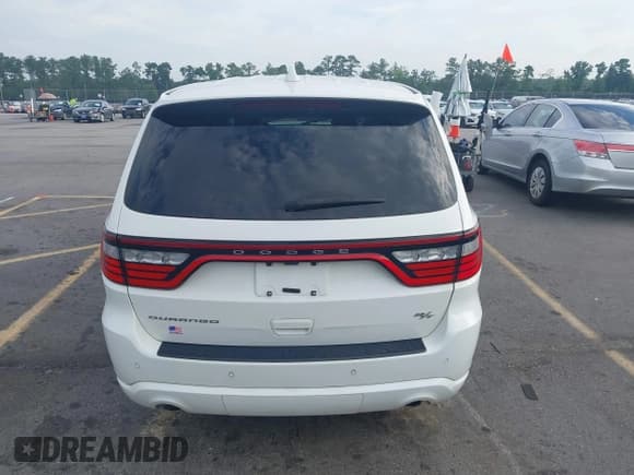✅ 2022 Dodge Durango R/T • VIN: 1C4SDHCTXNC131038 • Lot: 42700432. Listed on IAAI with 84,058 mi. Free auction sales archive from the USA and detailed vehicle history report at DreamBid. Image 16.
