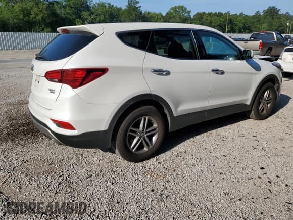 ✅ 2018 Hyundai Santa Fe 2.4L • VIN: 5NMZTDLB3JH053473 • Лот: 52537603. Опубликован ранее на Copart с пробегом 86 533 миль. Бесплатный доступ к архиву аукционных продаж из США и подробный отчёт об истории автомобиля на DreamBid. Изображение 3.
