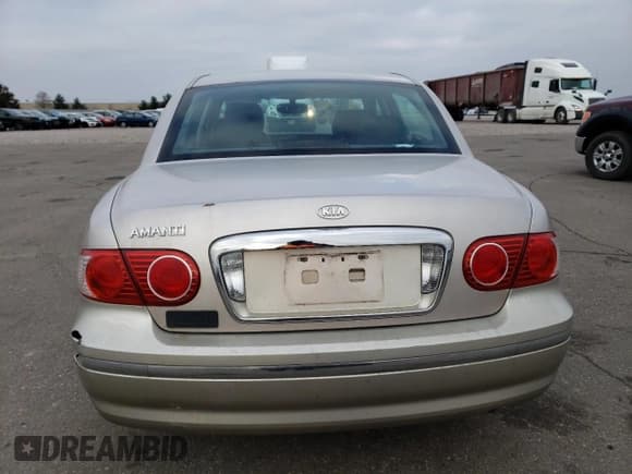 ✅ 2005 Kia Amanti • VIN: KNALD124355055394 • Лот: 85563264. Опубликован ранее на Copart с пробегом 173 864 миль. Бесплатный доступ к архиву аукционных продаж из США и подробный отчёт об истории автомобиля на DreamBid. Изображение 6.