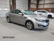 ✅ 2011 Kia Optima EX • VIN: KNAGN4A63B5094324 • Lot: 43422427. Listed on IAAI with 94,390 mi. Free auction sales archive from the USA and detailed vehicle history report at DreamBid. Image 1.