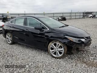 ✅ 2017 Chevrolet Cruze Premier • VIN: 1G1BF5SM3H7114686 • Lot: 37213653. Listed on Copart with 61,587 mi. Free auction sales archive from the USA and detailed vehicle history report at DreamBid. Image 4.