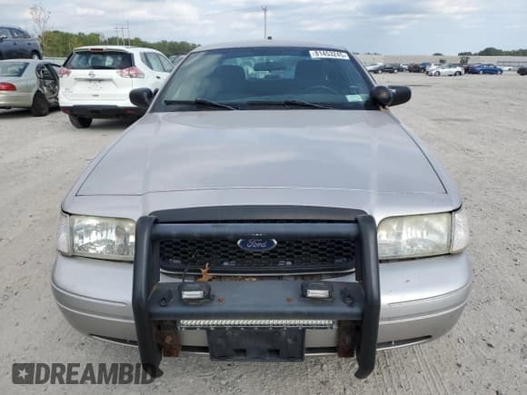 ✅ 2011 Ford Police Interceptor • VIN: 2FABP7BV4BX135837 • Lot: 81453245. Listed on Copart with 99,802 mi. Free auction sales archive from the USA and detailed vehicle history report at DreamBid. Image 5.