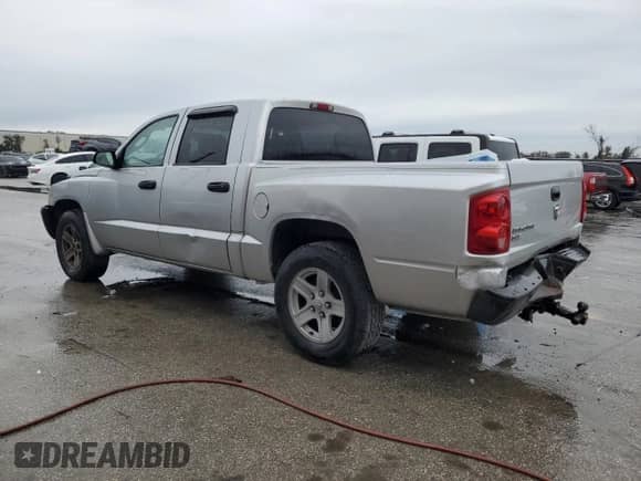 2007 Dodge Dakota ST с VIN 1D7HE28K57S127580, выставлен на аукционе Copart как лот 89140415 с пробегом 219 408 миль миль и Списание • Salvage title. История ставок и продаж доступна на DreamBid. Изображение 2.