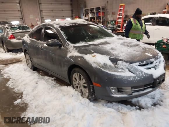 ✅ 2010 Mazda 6 i Touring • VIN: 1YVHZ8CH6A5M17713 • Lot: 43817977. Listed on IAAI with 182,469 mi. Free auction sales archive from the USA and detailed vehicle history report at DreamBid. Image 1.