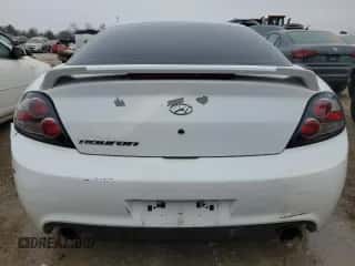2008 Hyundai Tiburon GS с VIN KMHHM66DX8U290154, выставлен на аукционе Copart как лот 67054434 с пробегом 191 963 миль миль и На запчасти • Non repairable. История ставок и продаж доступна на DreamBid. Изображение 6.