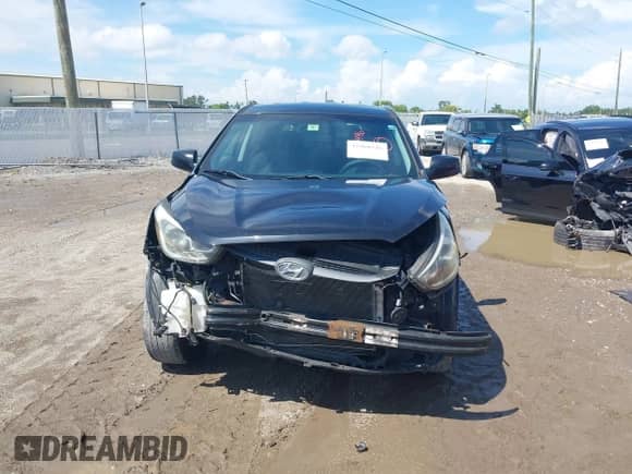 2014 Hyundai Tucson GLS with VIN KM8JTCAF4EU882575, listed as a IAAI auction lot 42960446 with 119,923 mi miles and . Bid and sale history available at DreamBid. Image 13.
