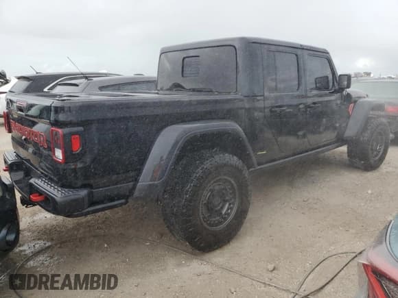 ✅ 2022 Jeep Gladiator Rubicon • VIN: 1C6JJTBG5NL101657 • Lot: 74682144. Listed on Copart with 13,352 mi. Free auction sales archive from the USA and detailed vehicle history report at DreamBid. Image 3.