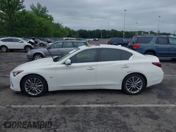 ✅ 2019 Infiniti Q50 Luxe • VIN: JN1EV7AP0KM519656 • Lot: 42604670. Wystawiony na IAAI z przebiegiem 118 126 mil. Bezpłatny archiwum sprzedaży aukcyjnych z USA i szczegółowy raport historii pojazdu na DreamBid. Zdjęcie 14.