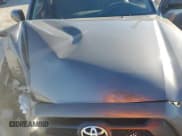 ✅ 2014 Toyota Tacoma • VIN: 5TFNX4CN1EX041963 • Lot: 84404205. Listed on Copart with 143,427 mi. Free auction sales archive from the USA and detailed vehicle history report at DreamBid. Image 11.