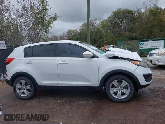 ✅ 2012 Kia Sportage LX • VIN: KNDPB3A29C7284458 • Lot: 43549931. Listed on IAAI with 88,133 mi. Free auction sales archive from the USA and detailed vehicle history report at DreamBid. Image 13.