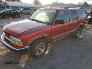 2000 Chevrolet Blazer LT z VIN 1GNCS13W0Y2279860, wystawiony jako Copart lot #85297234 z przebiegiem 192 927 mil mil oraz Szkoda całkowita • Salvage title. Historia ofert i sprzedaży dostępna na DreamBid. Obrazek 1.