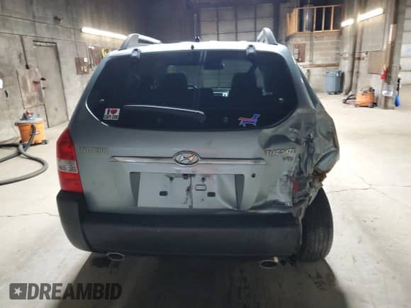 2007 Hyundai Tucson SE z VIN KM8JN72D47U485403, wystawiony jako Copart lot #82332324 z przebiegiem 133 370 mil mil oraz Szkoda całkowita • Salvage title. Historia ofert i sprzedaży dostępna na DreamBid. Obrazek 6.